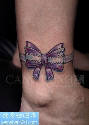 点击大图看下一张:上海纹身店苍龙纹身作品:脚踝蝴蝶结纹身
