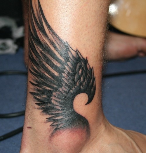 点击大图看下一张：脚踝部个性的翅膀纹身图2