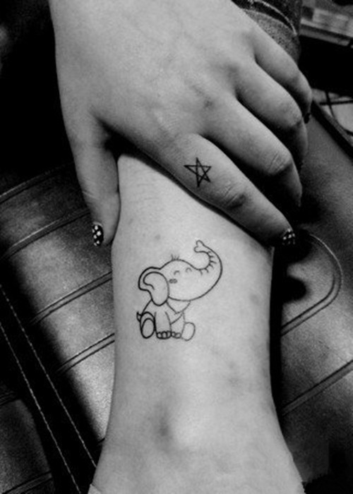 点击大图看下一张：个性有趣的小象纹身