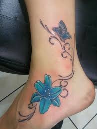 点击大图看下一张：脚踝漂亮的花朵纹身图案图2