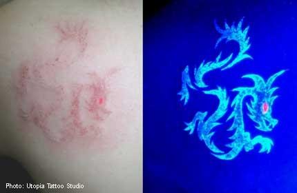 点击大图看下一张：时尚绚丽的荧光纹身图4