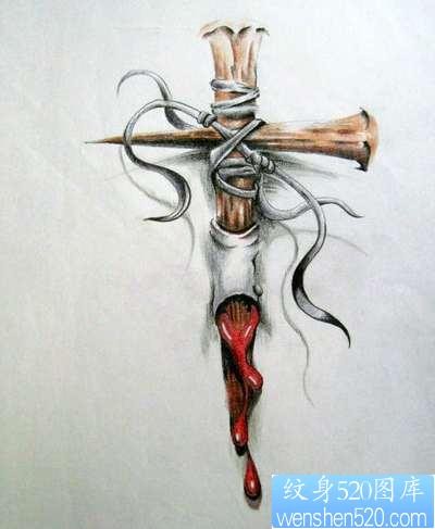 点击大图看下一张：一张流行漂亮的滴血十字架纹身图片图案