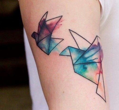 点击大图看下一张:一幅图腾爱心与飞机纹身图片图2