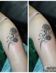 女人手臂小巧唯美的向日葵花纹身图片