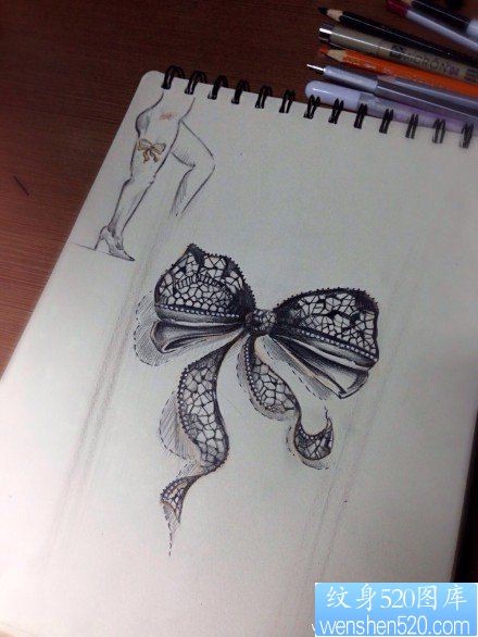 点击大图看下一张：一组时尚精美的蕾丝蝴蝶结纹身图片