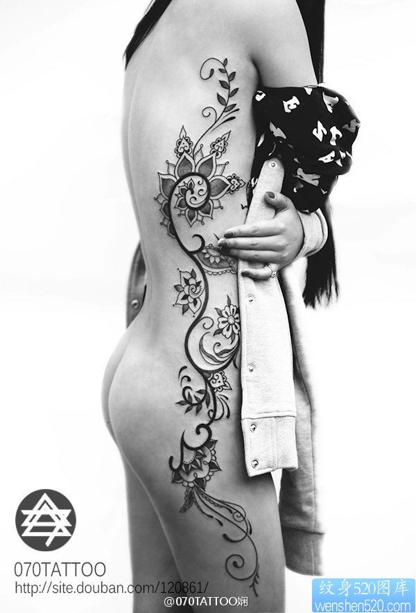 点击大图看下一张:一幅超性感火爆的藤花纹身图片