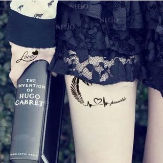 点击大图看下一张：漂亮唯美的心电图纹身图4