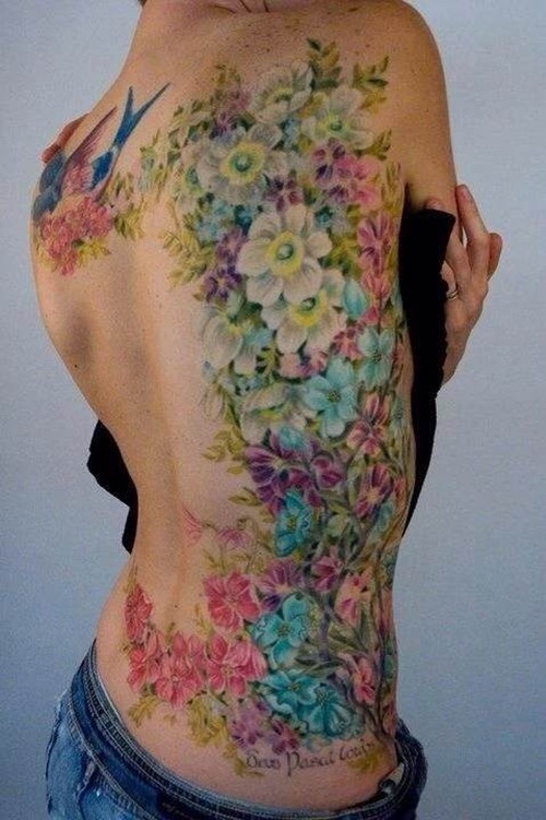 点击大图看下一张：腰部植物图案纹身