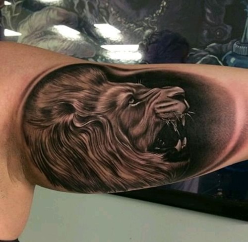 点击大图看下一张：手臂上经典唐狮纹身图7