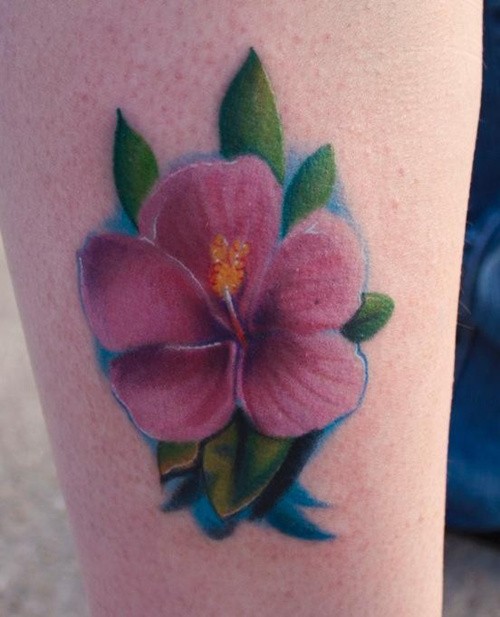 点击大图看下一张：脚部好看的花朵纹身