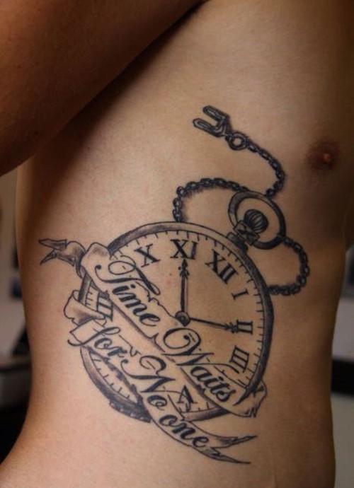 点击大图看下一张：腰部上的时钟纹身图3