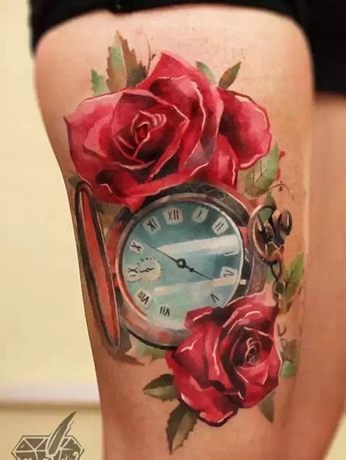 点击大图看下一张：唯美的钟表玫瑰纹身