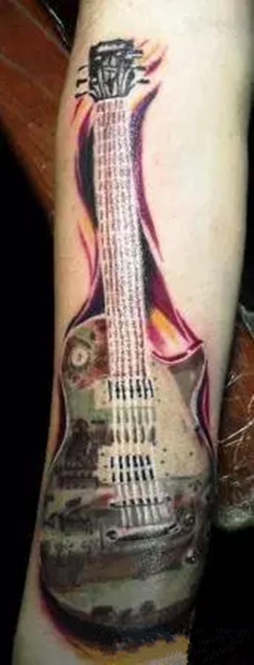 点击大图看下一张：一组逼真的手臂吉他纹身图5