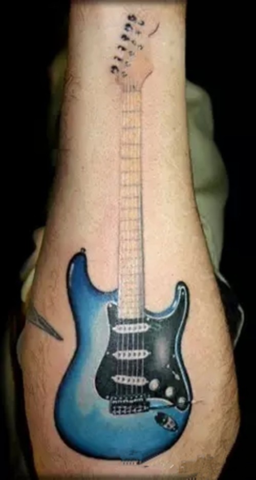 点击大图看下一张：一组逼真的手臂吉他纹身图6