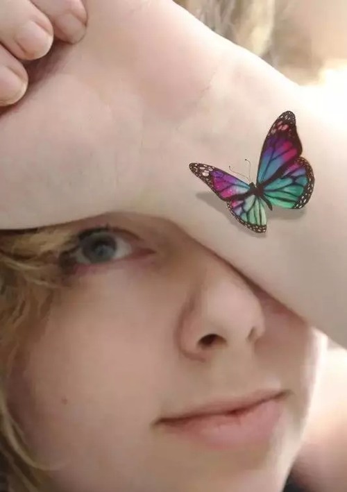 点击大图看下一张：清新淡雅的蝴蝶纹身图7