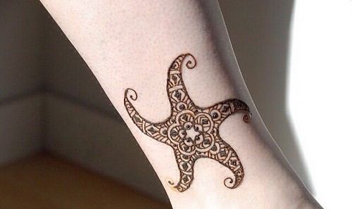 点击大图看下一张：海星图案纹身