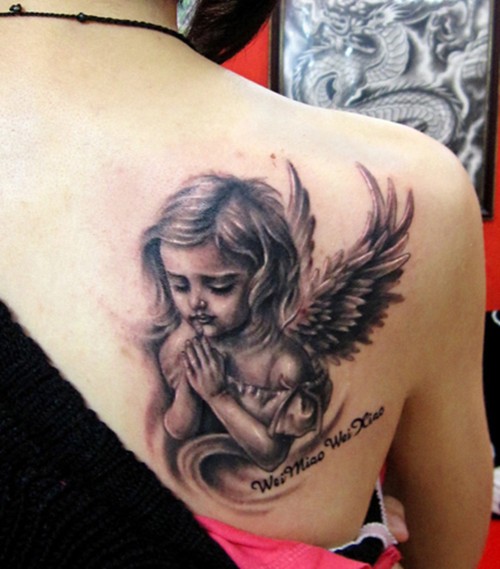 点击大图看下一张：可爱的小天使纹身图案