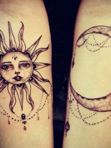 另类的太阳与月亮一起的手臂纹身