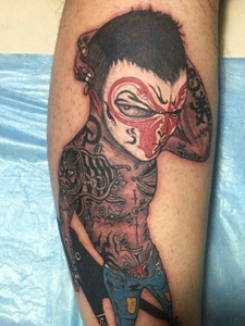 个性猴年大吉腿部纹身图片