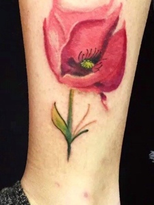 小腿外侧一朵漂亮花朵纹身图片