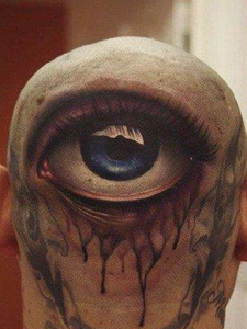 头部逼真的3D大眼睛纹身图案