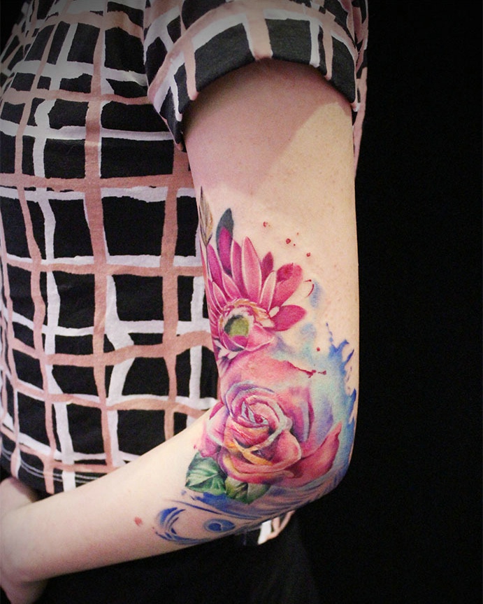 点击大图看下一张：性感美丽的手臂花朵纹身图片(1/1)