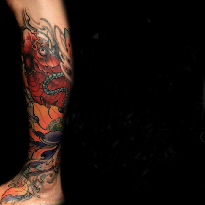 点击大图看下一张：腿部红鲤鱼纹身图片惊艳可爱(1/1)