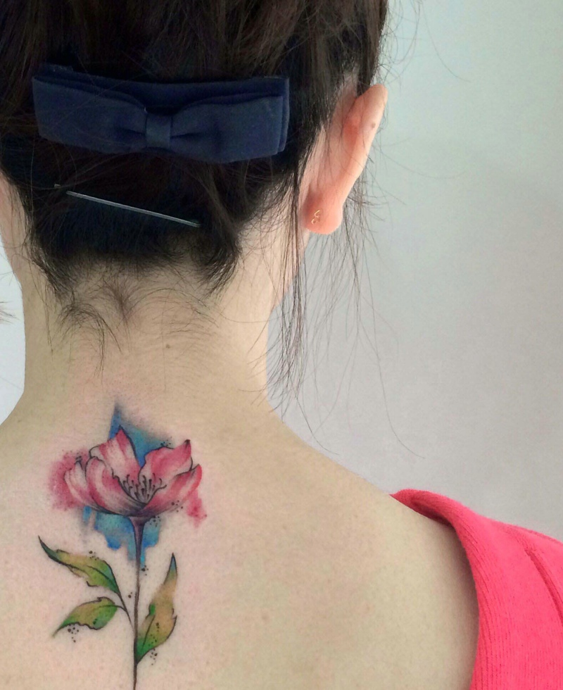 点击大图看下一张:脊椎部的时尚精美花朵纹身图片(1/1)