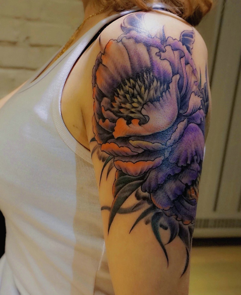 点击大图看下一张：白衣美女大臂花朵纹身图片香气十足(1/1)