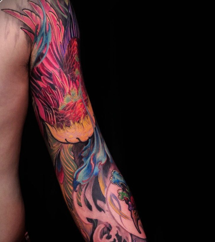 点击大图看下一张：相当惊艳的手臂火凤凰纹身图片