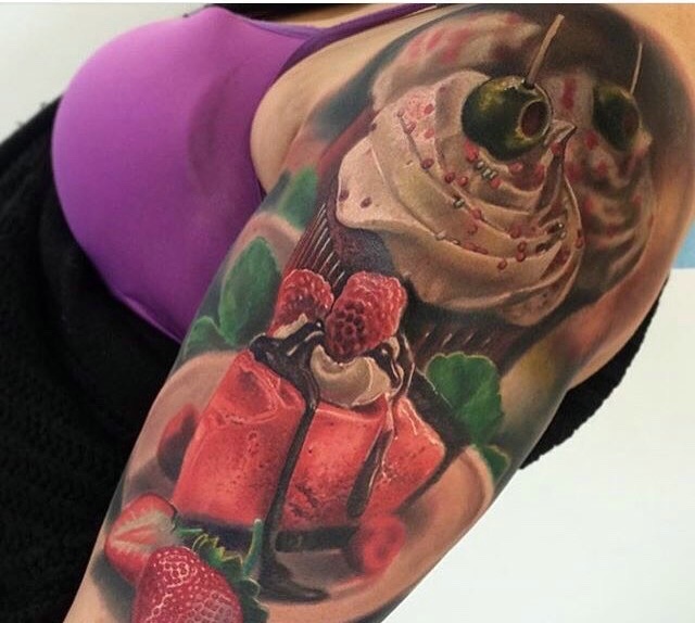 点击大图看下一张:适合吃货们的大臂零食纹身刺青