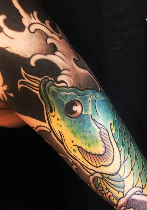 点击大图看下一张：花臂鲤鱼纹身图片酷到极限