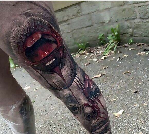 点击大图看下一张：非常邪恶恐怖的腿部3d图腾纹身刺青