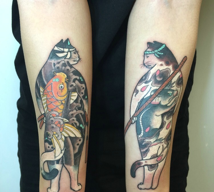 点击大图看下一张：双手臂日式创意的图腾纹身刺青