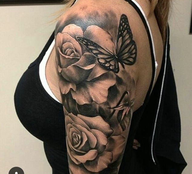 点击大图看下一张：花朵与蝴蝶一起的花臂纹身图案