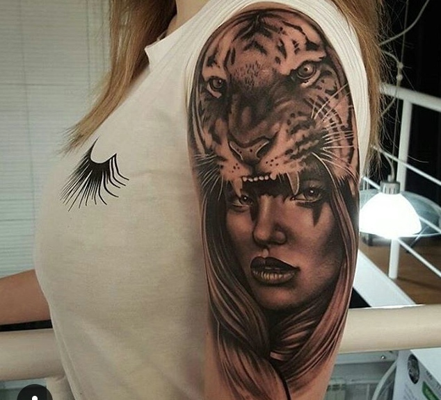 点击大图看下一张：女生花臂老虎与女郎一起的纹身刺青