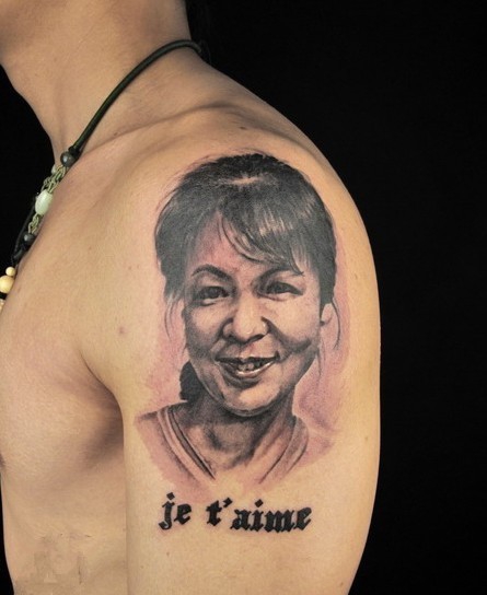 点击大图看下一张:逼真写实的肖像纹身