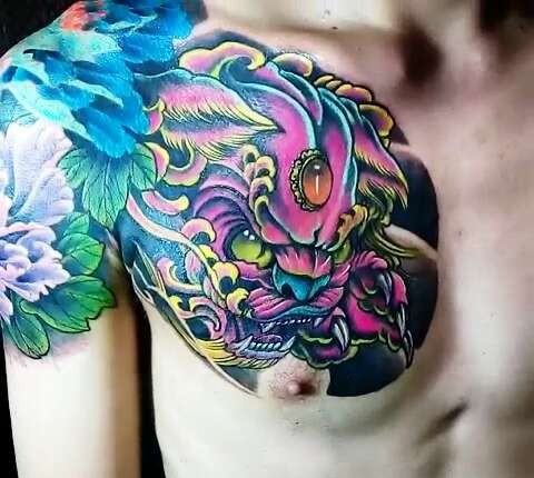 点击大图看下一张:传统中国风唐狮半甲纹身