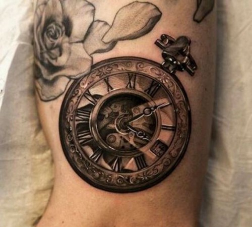 点击大图看下一张:个性潮流钟表时钟图案腿部纹身