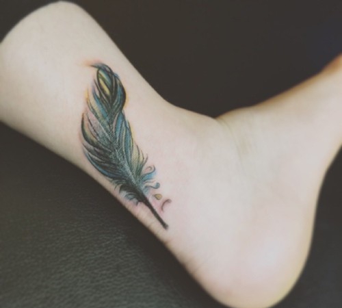 点击大图看下一张：简单的脚踝小纹身