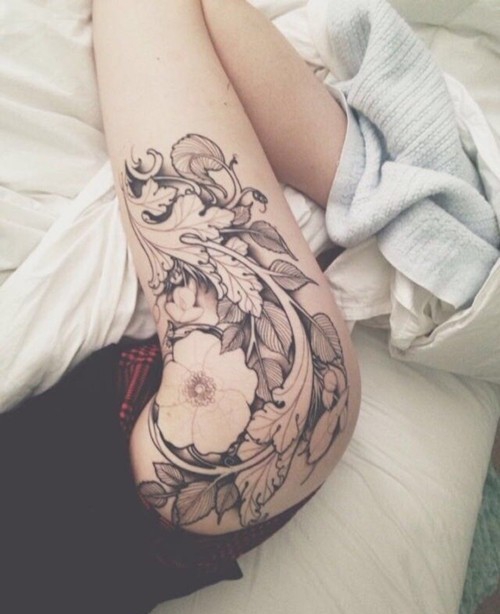 点击大图看下一张：女生性感腿部大腿花朵纹身