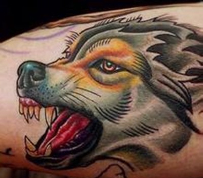 点击大图看下一张:凶猛霸气的狼纹身