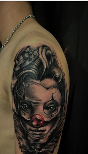 点击大图看下一张:一组个性的大臂上小丑纹身图案