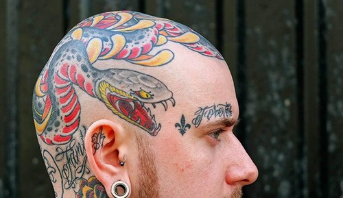 点击大图看下一张：大胆夸张的头部纹身