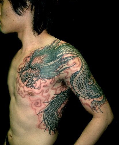 点击大图看下一张:超霸气凶猛的过肩龙纹身大全