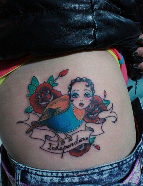 点击大图看下一张：麻雀小姐玫瑰腰部纹身图案