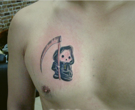 点击大图看下一张：男性胸部可爱的死神纹身