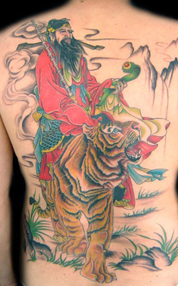 点击大图看下一张：仙人骑虎纹身图片