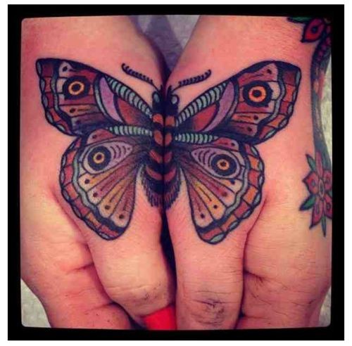 点击大图看下一张：双手合并的蝴蝶