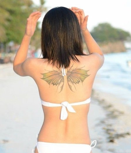 点击大图看下一张：另类蝴蝶翅膀后背纹身